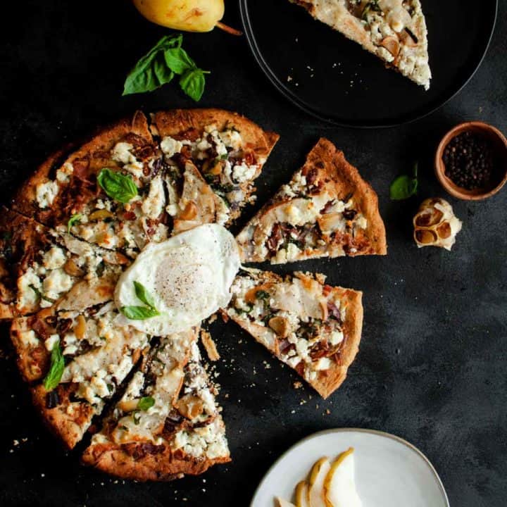 Pear and goat cheese pizza topped with an egg
