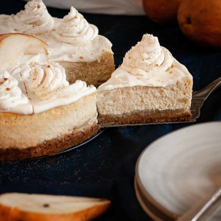 pear cheesecake being sliced