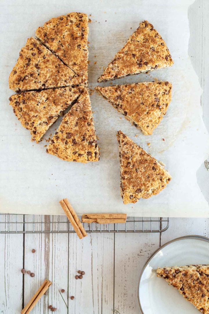 cinnamon scones cut into triangles displayed on cooling rack