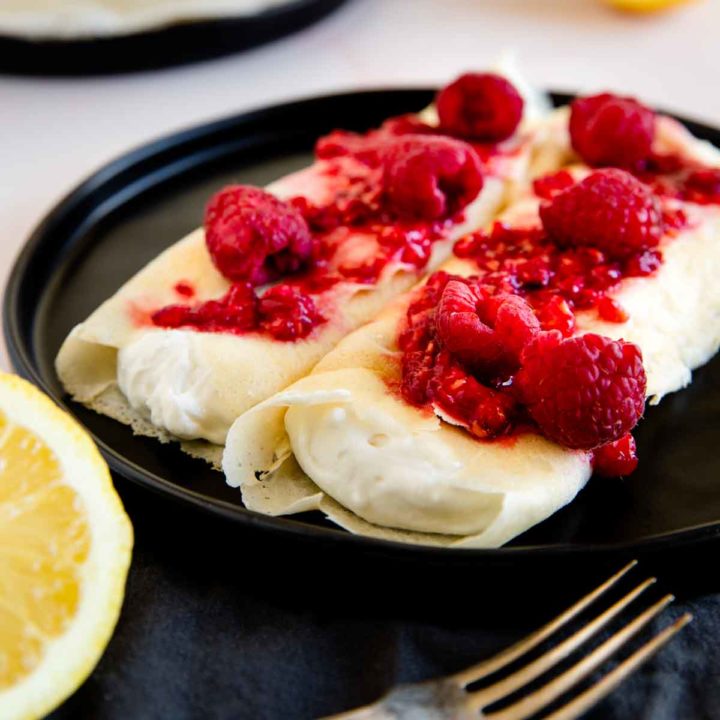 crepes filled with lemon ricotta filling and served with fresh raspberries