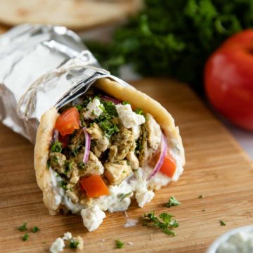 easy chicken gyro filled and ready to eat wrapped in foil and tied with a string